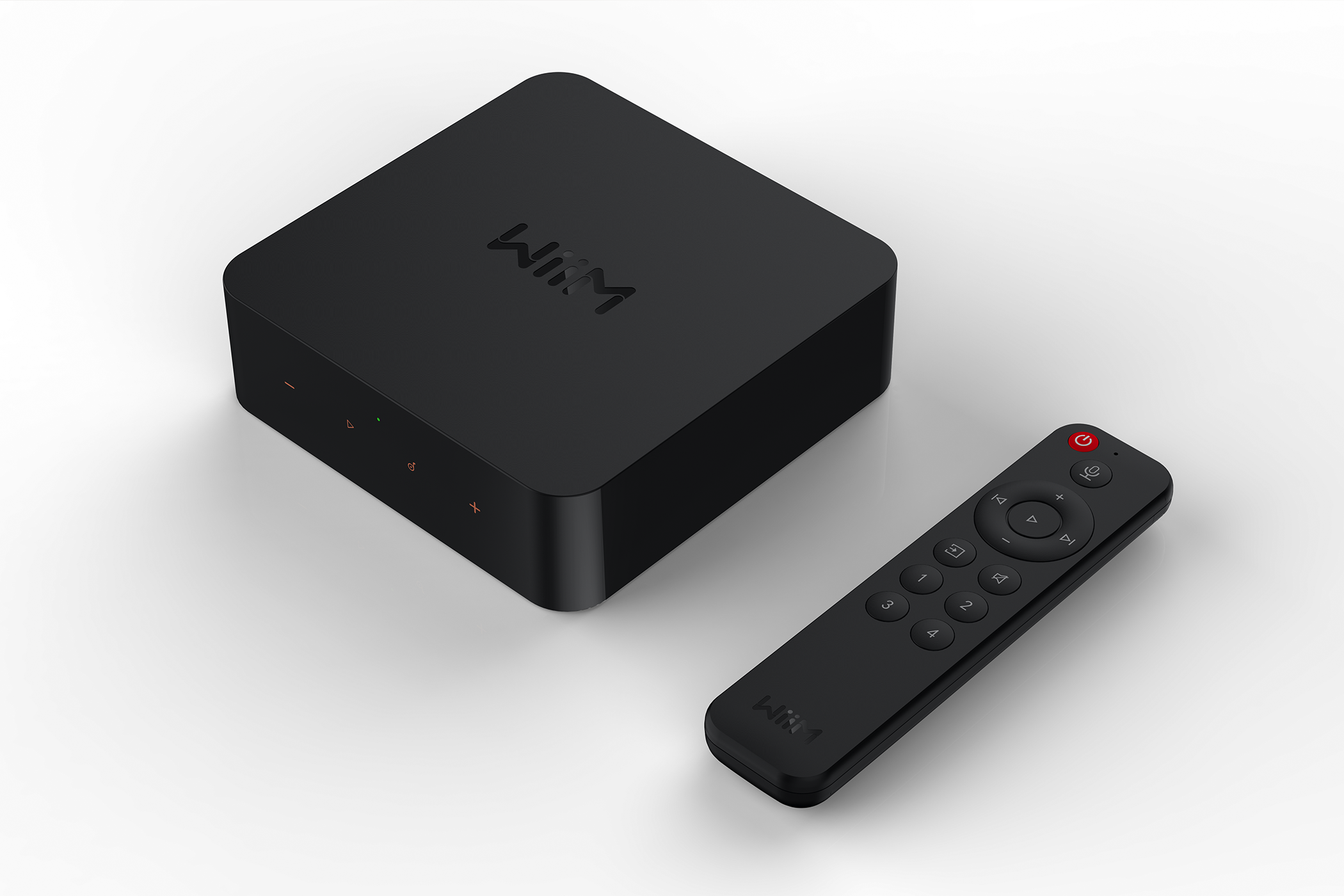 WiiM Pro Plus audio streamer box and remote.