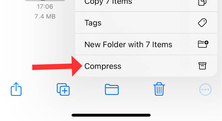 Files app with an arrow next to the Compress option