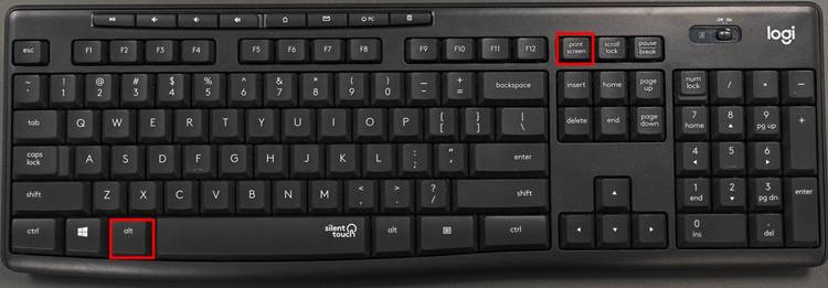 Hold the Alt key and press Print Screen.