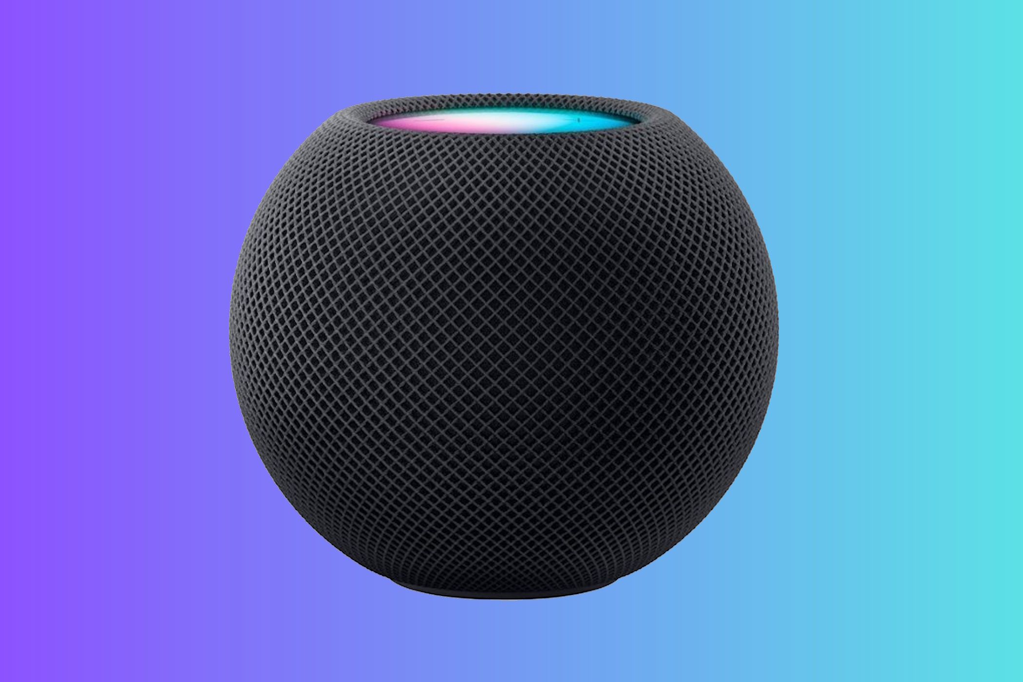 Apple's HomePod mini speaker set against a colorful gradient background