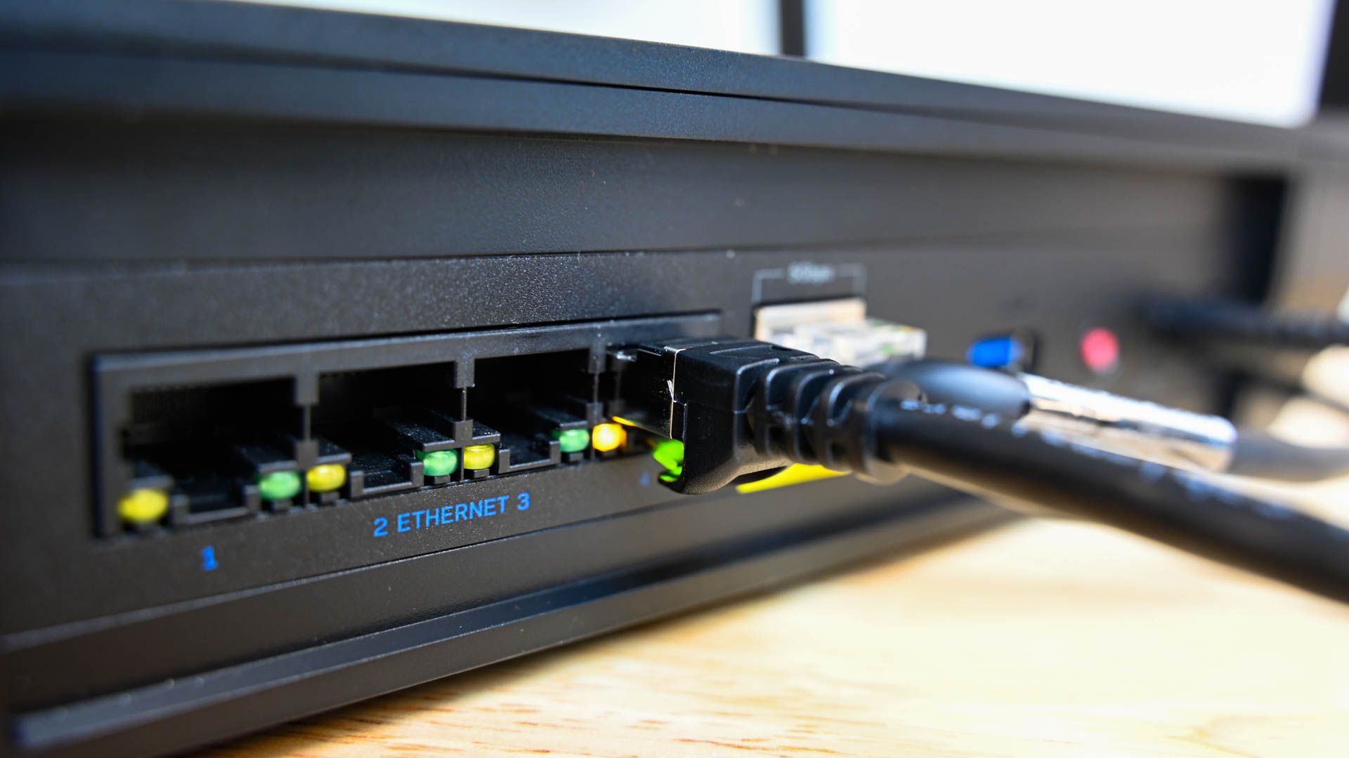 Ethernet cable plugged into an ethernet port on a router