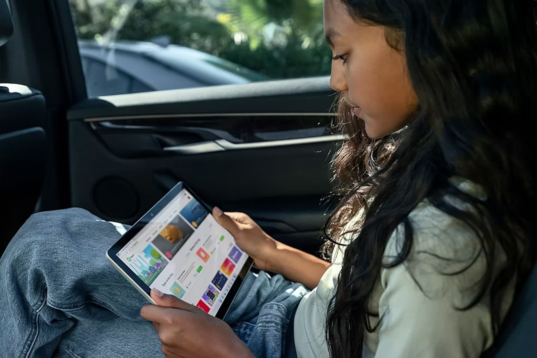 microsoft surface go 3 girl holding tablet in hands