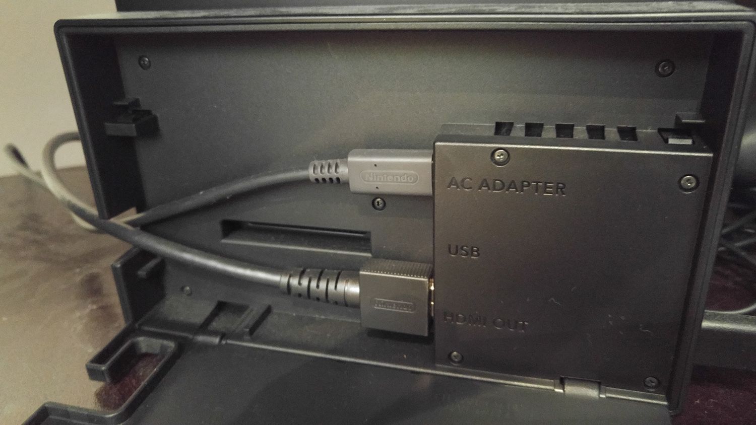 The AC Adapter port on the back of a Nintendo Switch dock.