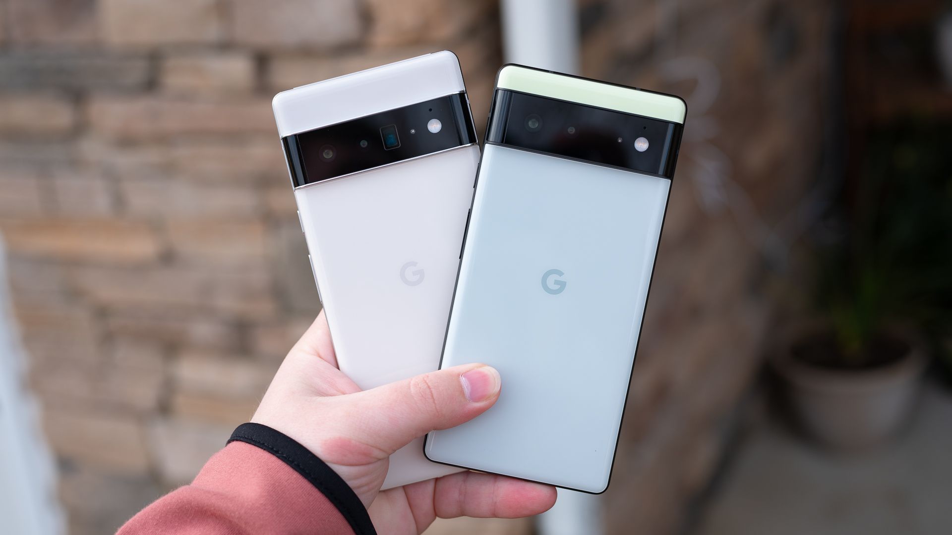 Pixel 6 Pro and Pixel 6 side by side in a hand. 
