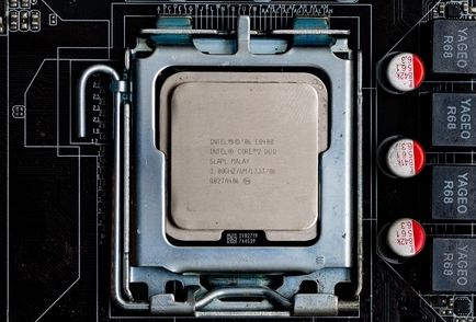 An Intel Core 2 Duo CPU in its socket with no heatsink.