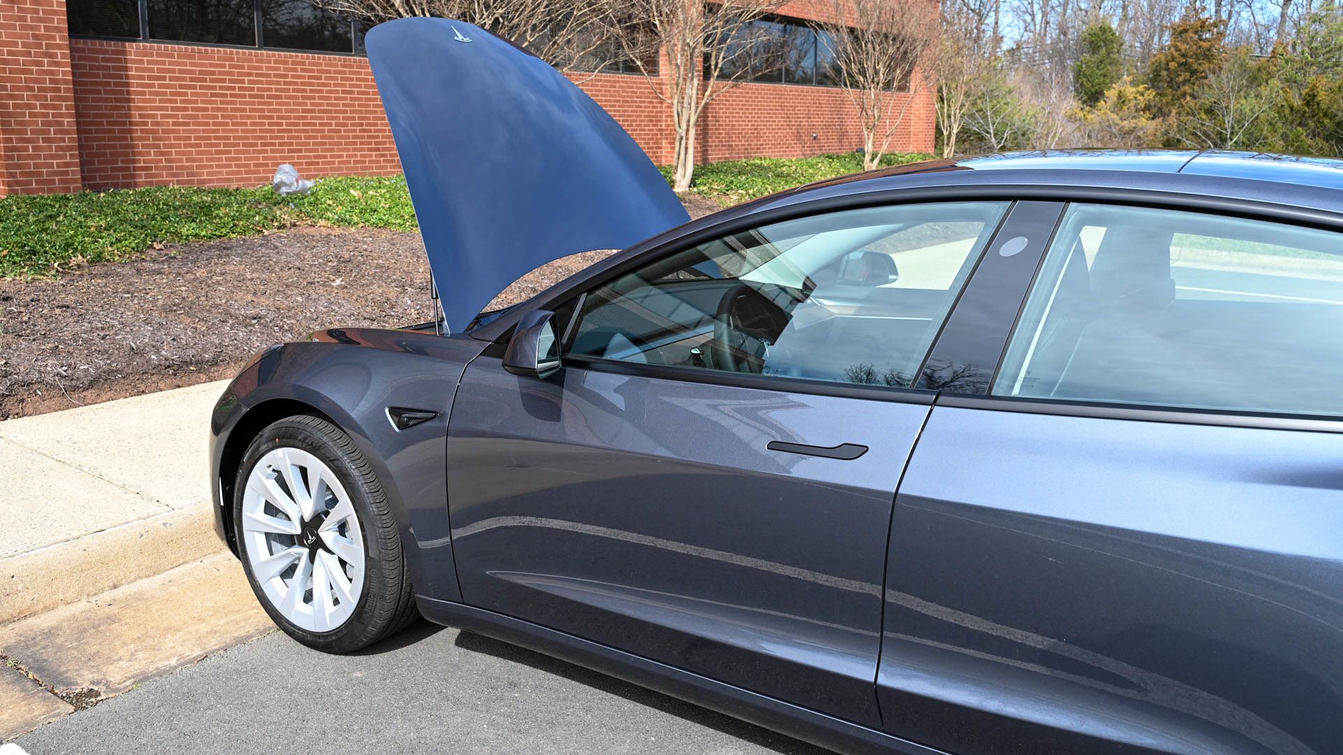 Front trunk open on a Tesla Model 3.