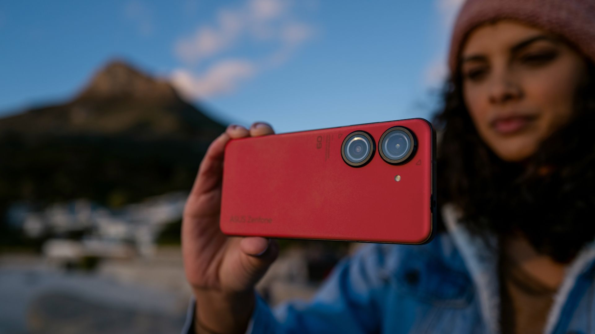 woman holding asus zenfone 9