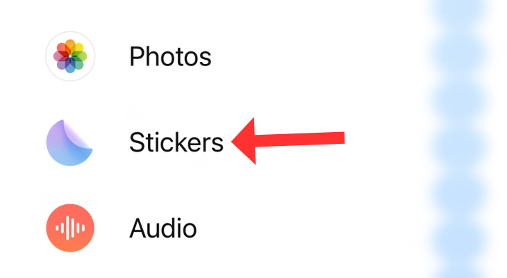 Apple Messages with an arrow next to the Stickers option