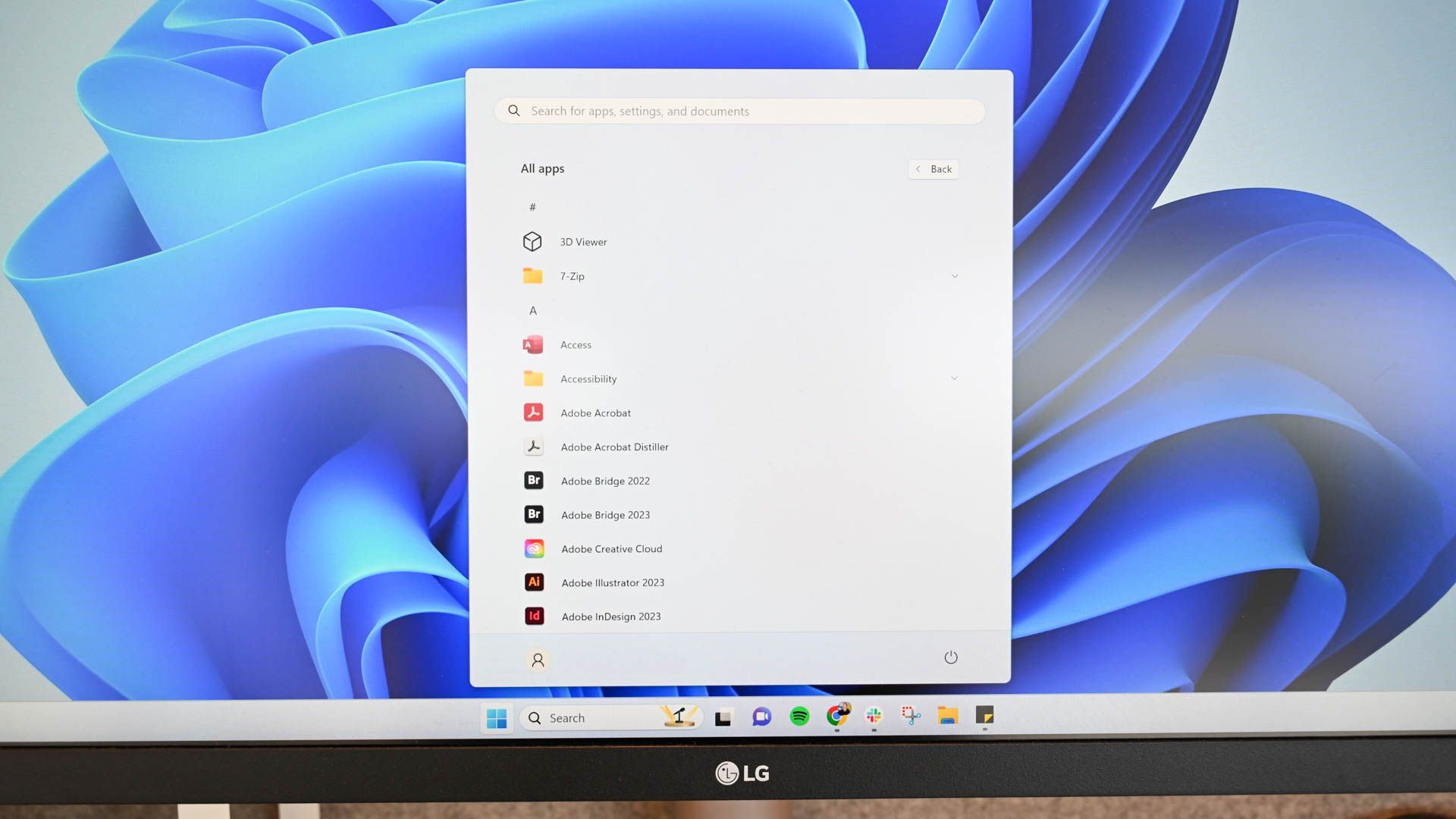 Some app icons visible in the Windows 11 Start Menu. 