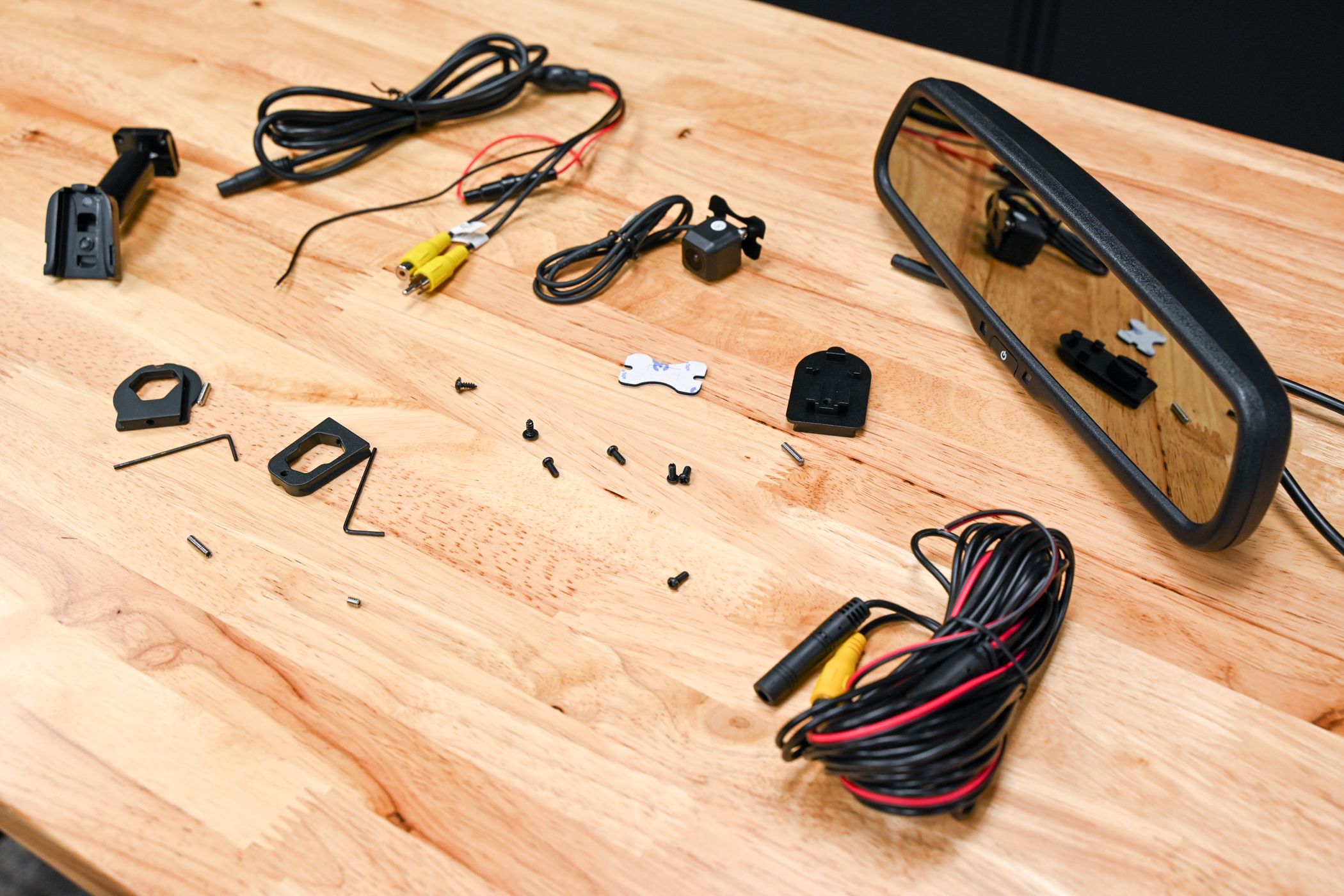 All of the included wires, screws, and tools needed for EchoMaster's backup camera kit