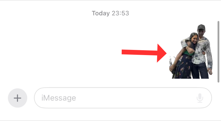 An arrow next to an animated sticker in Apple Messages