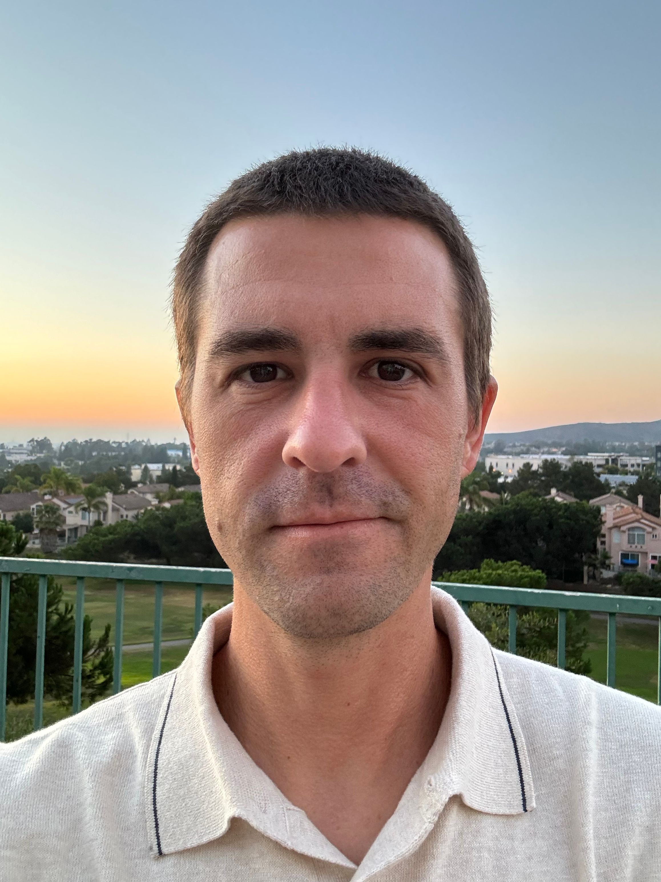 a protrait shot of a man at dusk