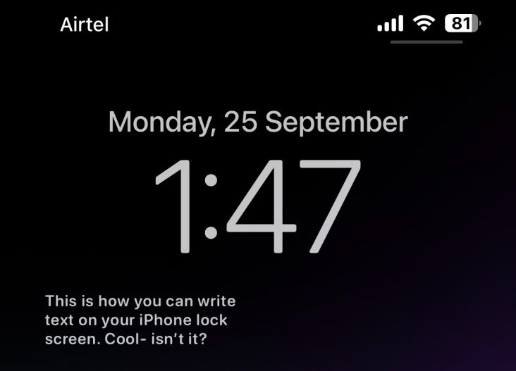 Text on an iPhone lock screen using the LockNotes widget.