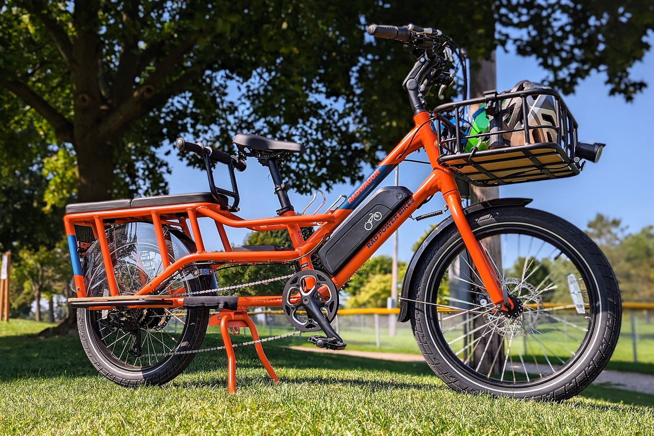 Rad Power RadWagon 4 on a grassy hill./