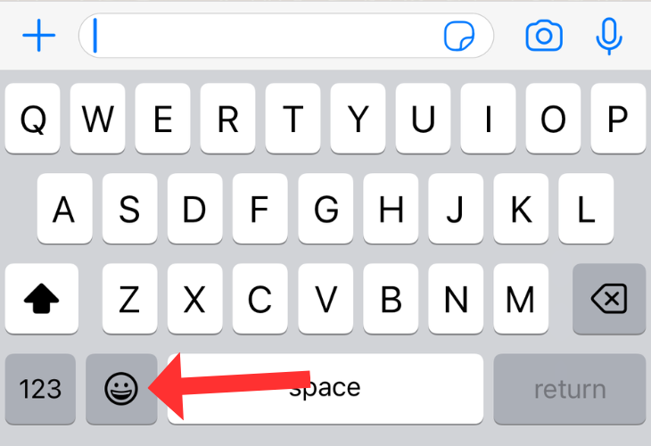 iPhone's keyboard highlighting the option to add emojis