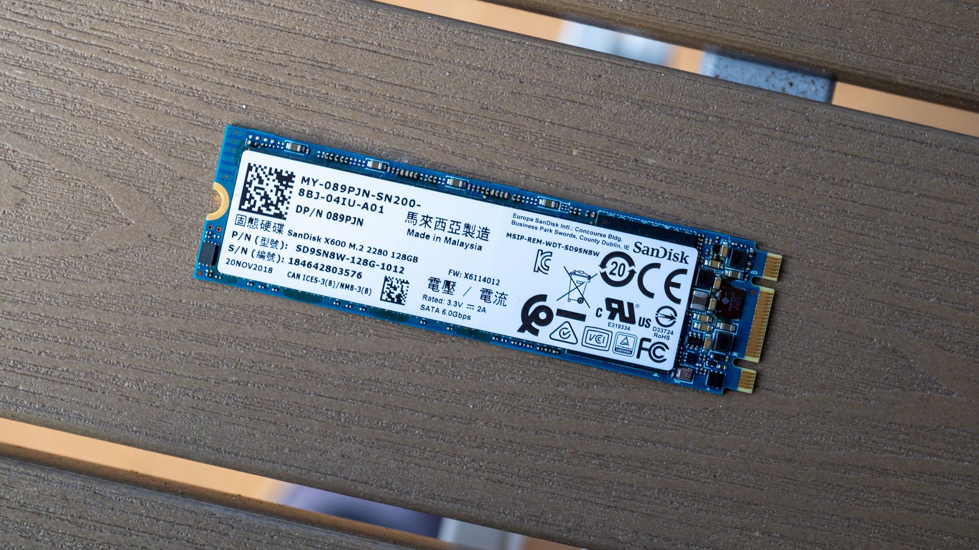 An NVMe SSD on a table. 