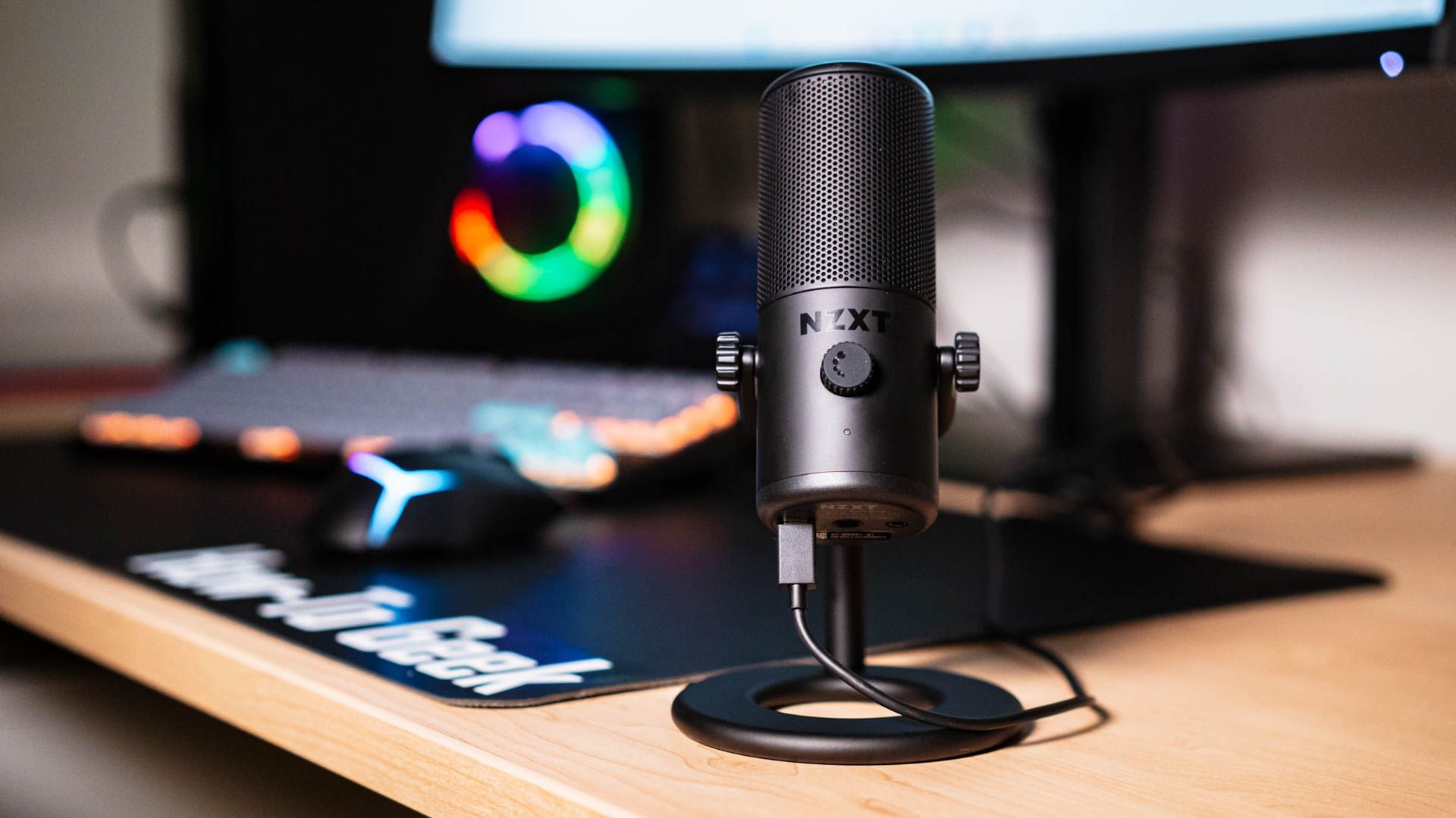 A microphone on a desk. 