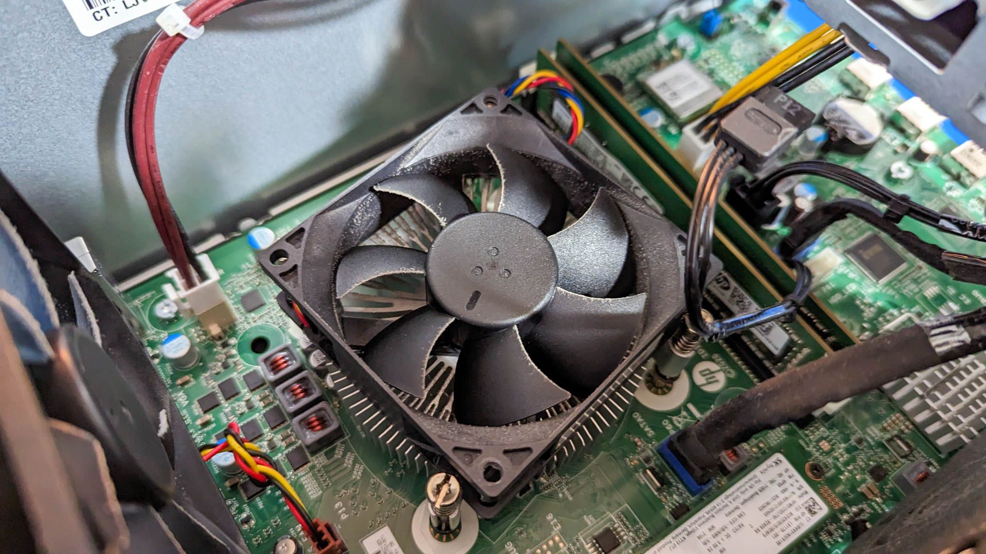 Dusty cooling fans inside a PC tower