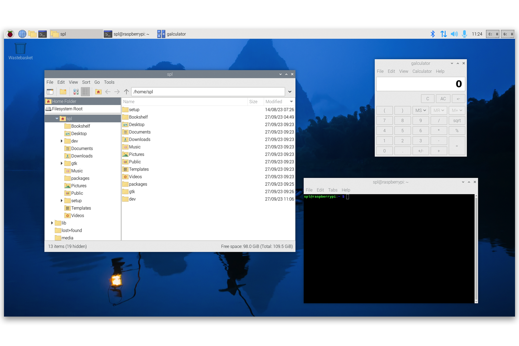A screenshot of the Raspberry Pi OS Bookworm desktop with a few windows open.