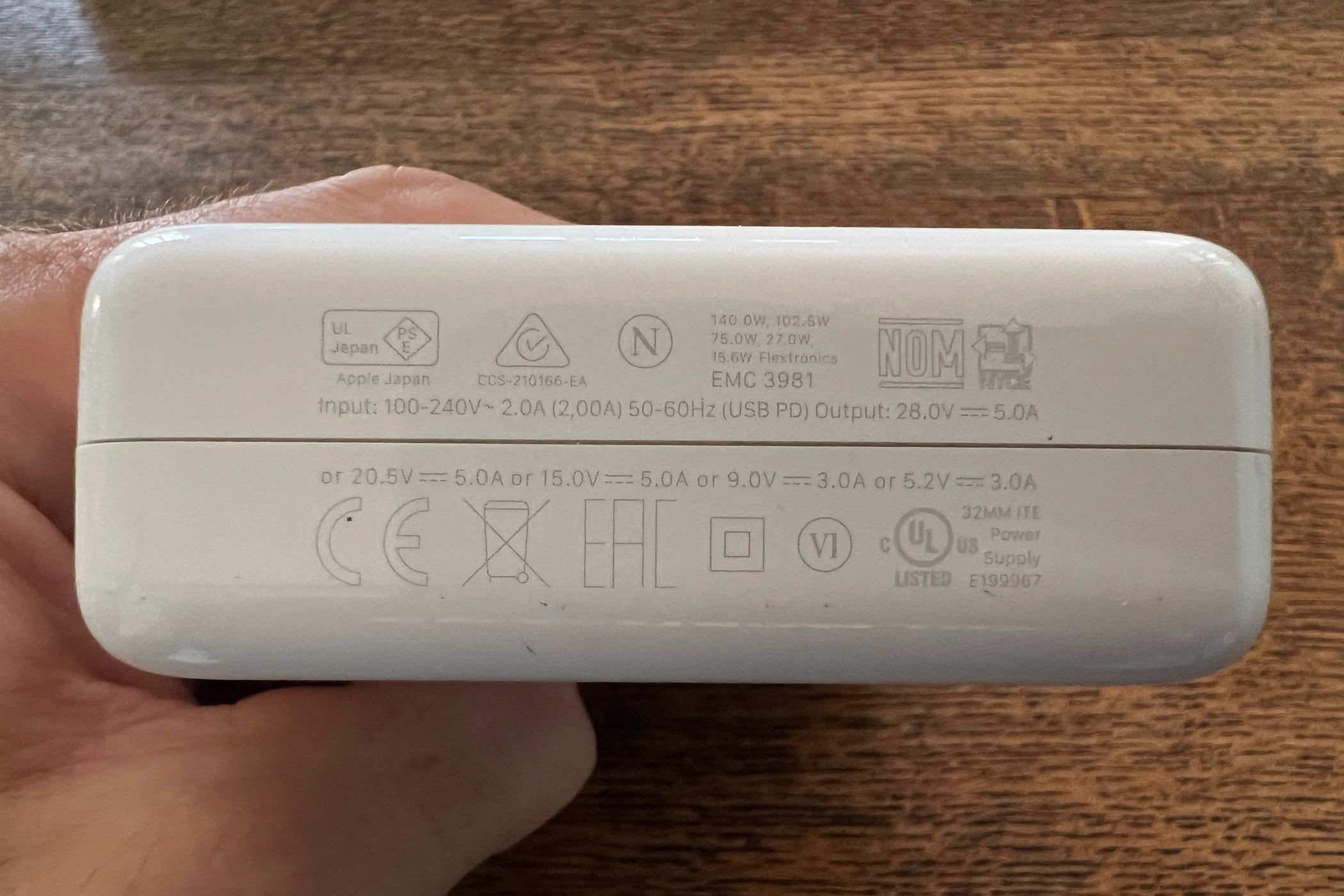 A MacBook charger's fine print