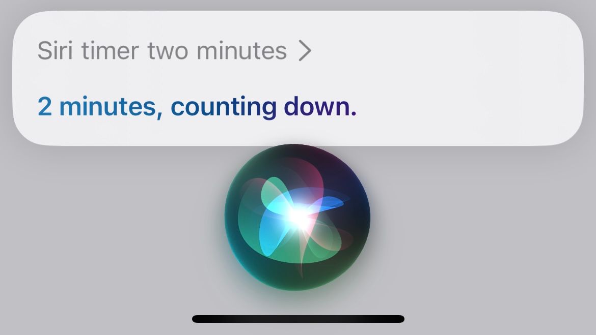 Telling Siri to timer, two minutes as a simpler form of issuing a command.