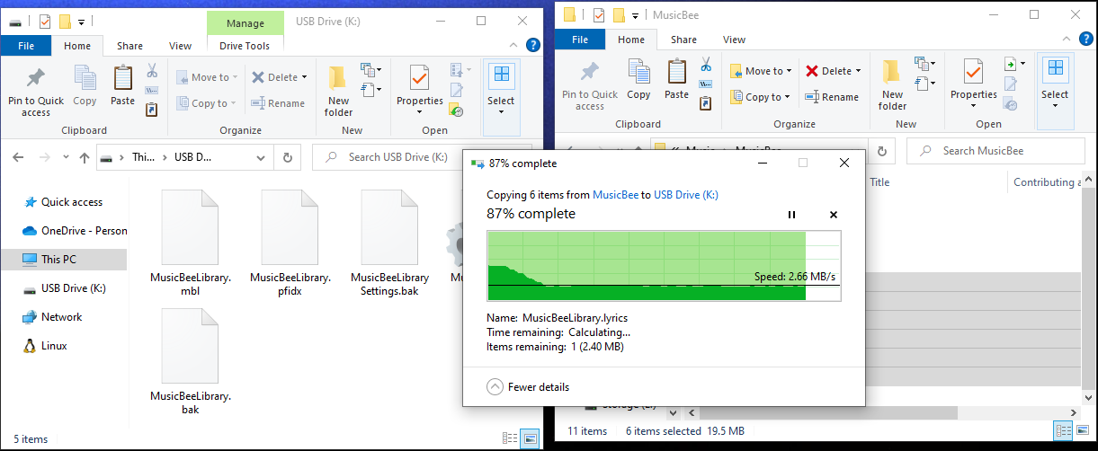 Files being pasted in a USB drive. 