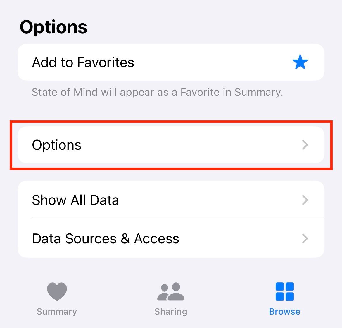 An iPhone highlighting the Options button for setting up reminders.