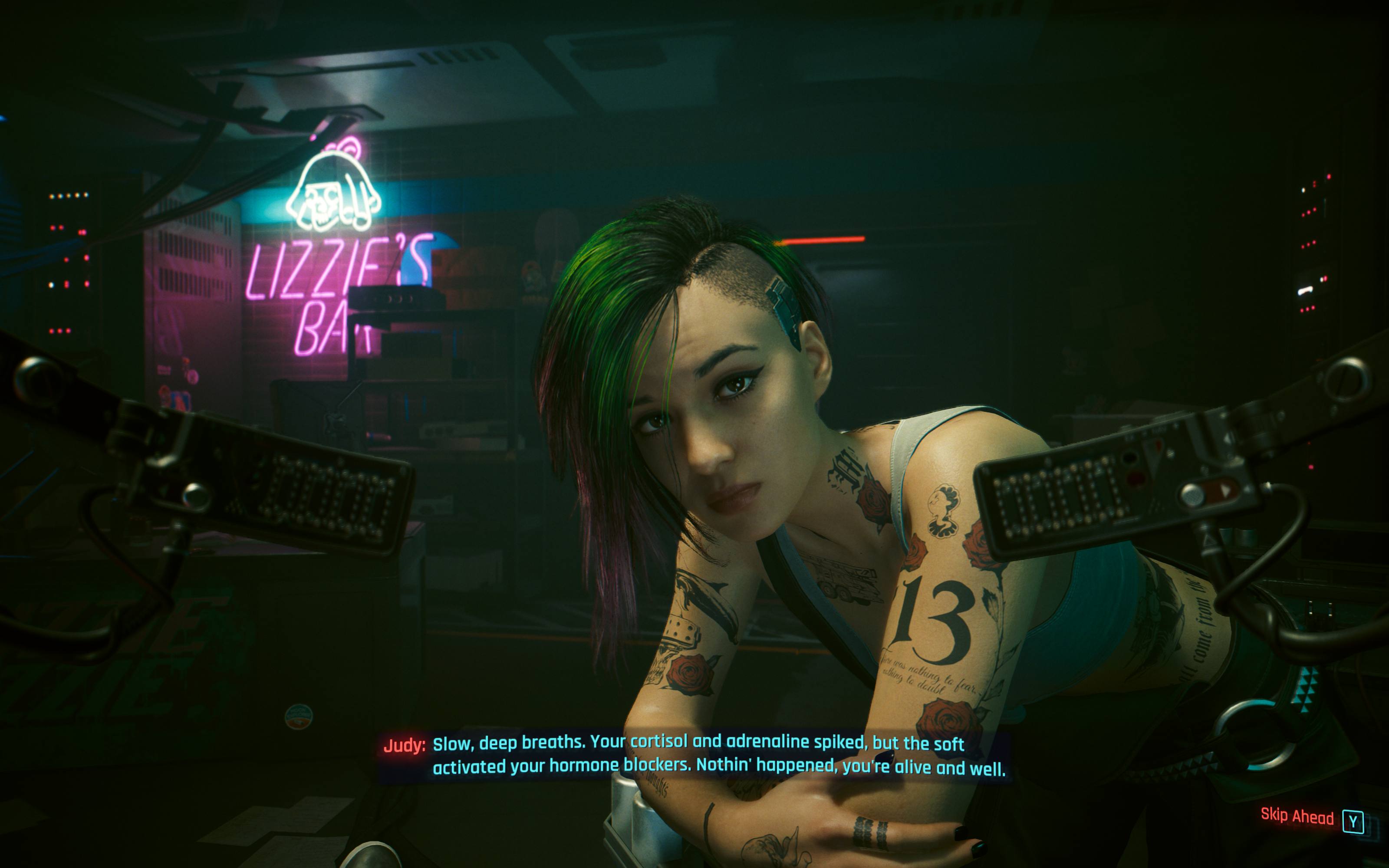 A screenshot of a virtual tattooed woman from the game "Cyberpunk 2077."