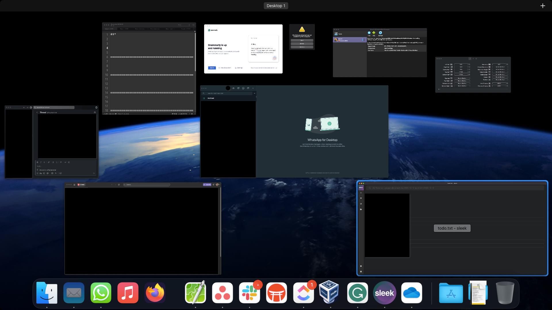 macOS Ventura screen after boot showing Mission Control with multiple apps open