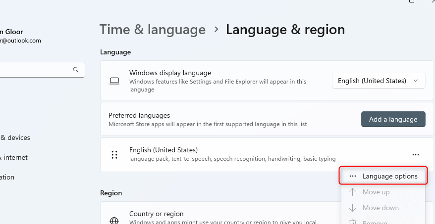 The Language &amp; Region settings in Windows 11 with the Language Options option highlighted.