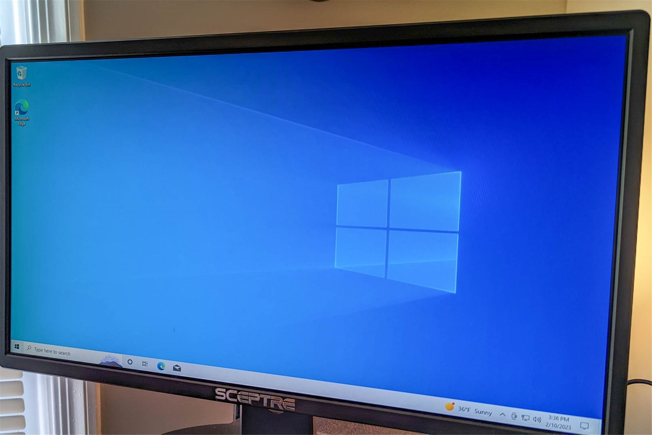 A Windows 10 PC with the default background. 