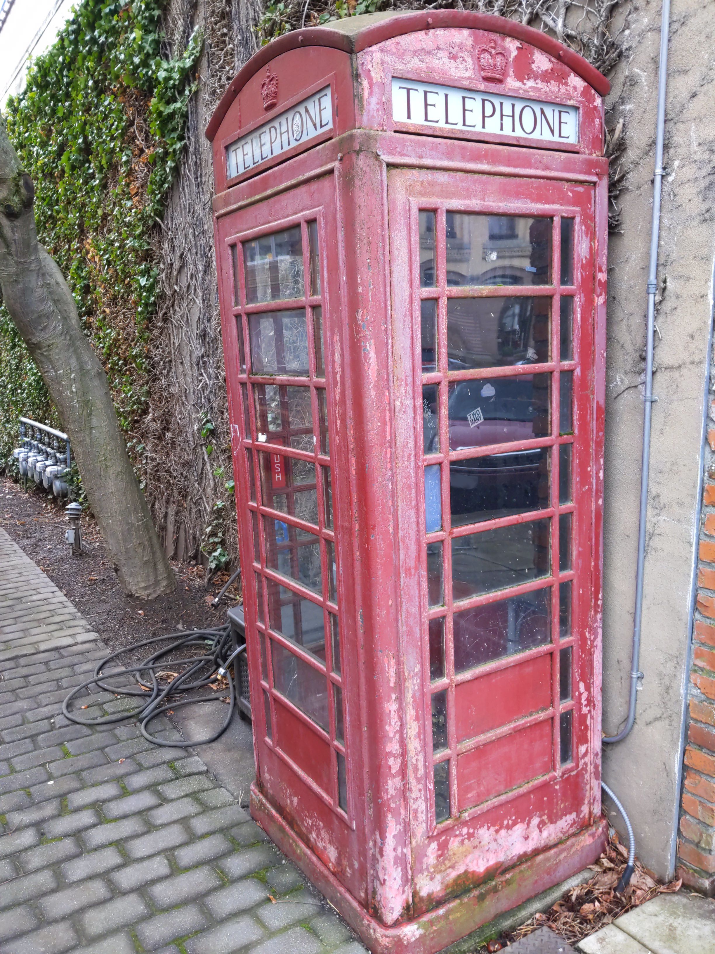 An old, red telephone booth