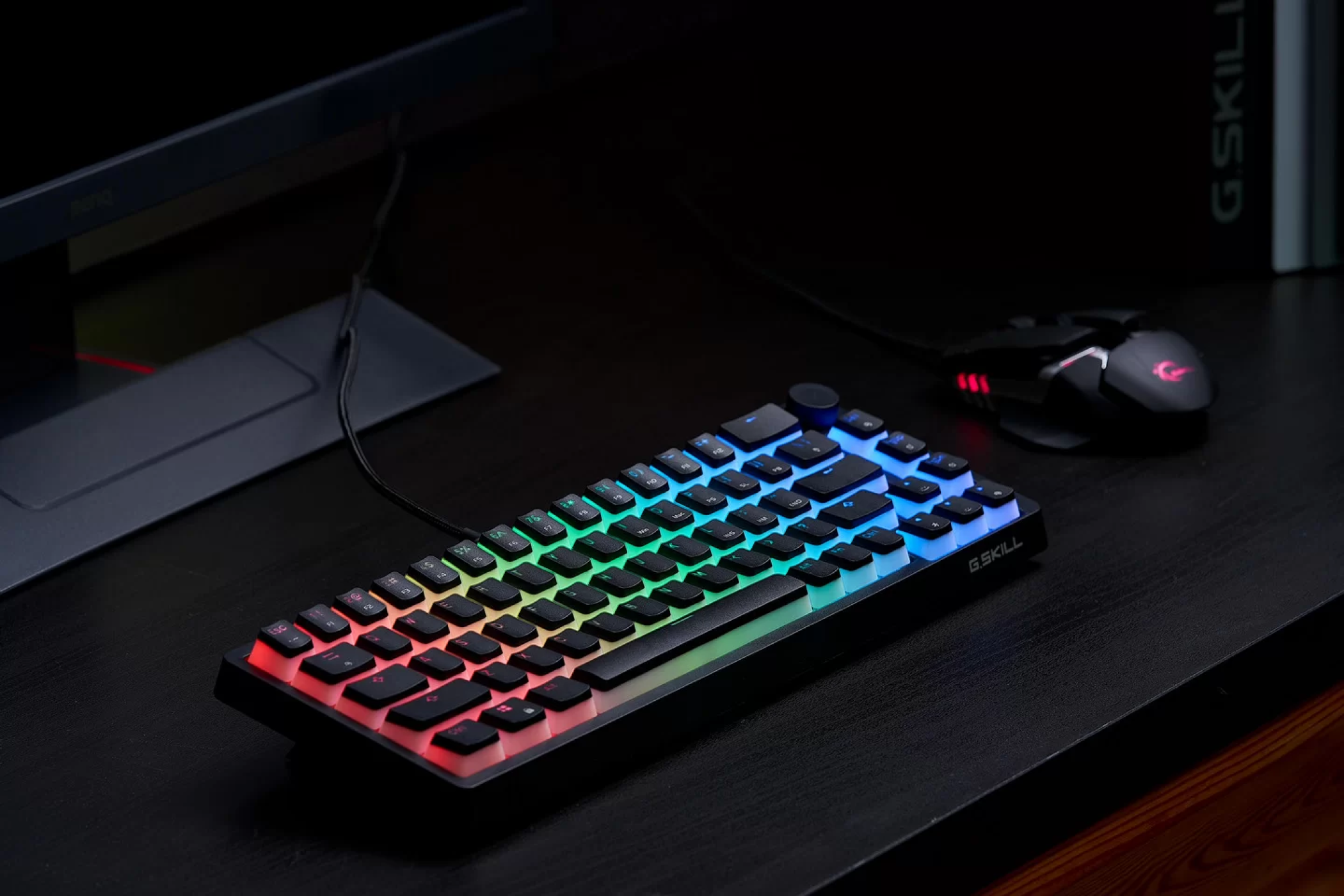 G.Skill KM250 RGB 65% laying on a computer table