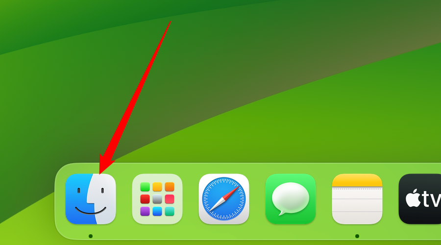 Click the Finder app on the dock.