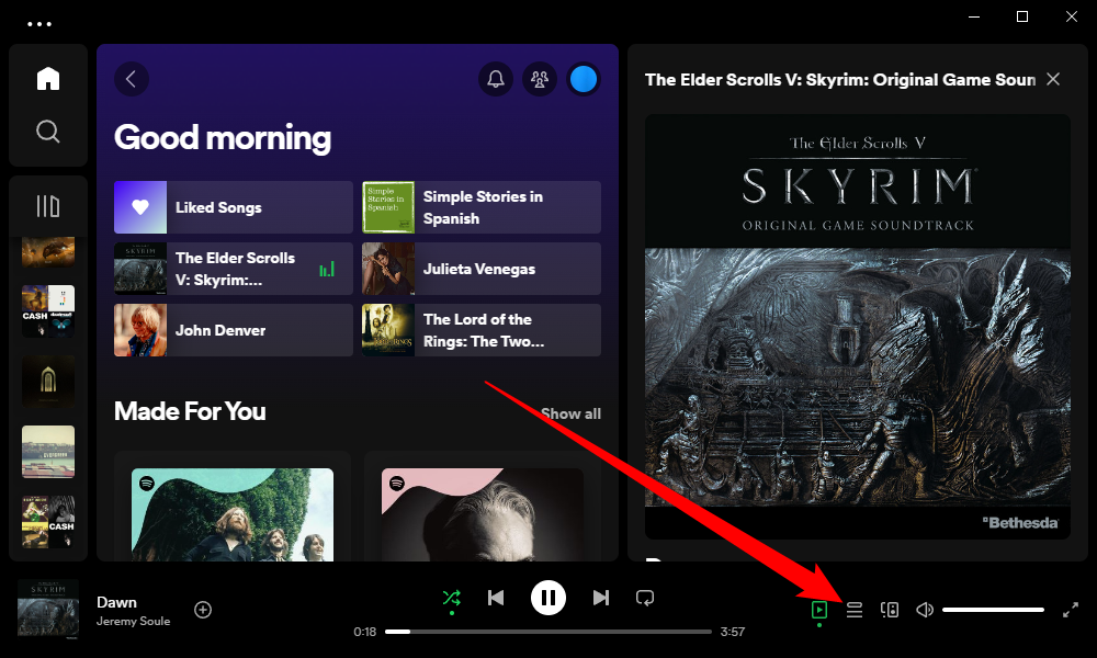 View your Spotify queue by clicking the queue button in the bottom right corner. 