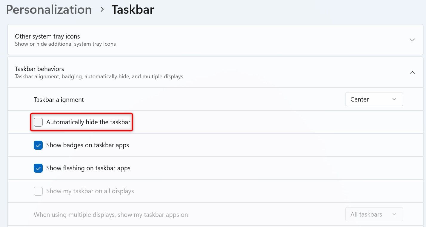 'Automatically Hide the Taskbar' highlighted in Windows 11 Settings.