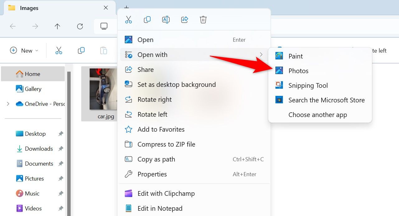Open With > Photos highlighted in a photo's context menu.