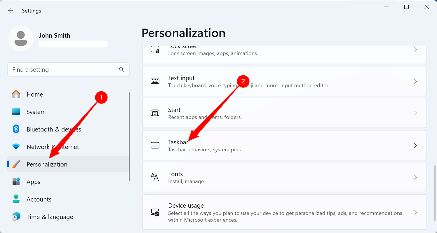 Click the 'Personalization' tab, then go to 'Taskbar.'