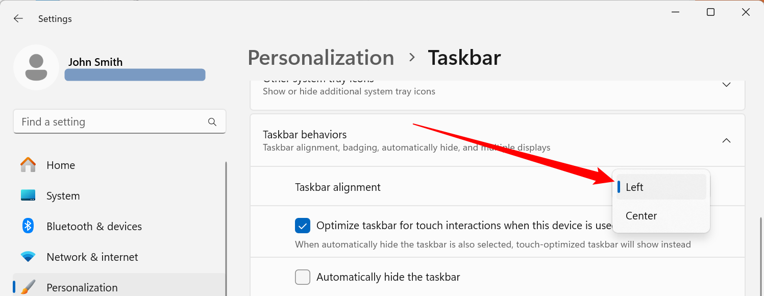 Set the taskbar alignment to 'Left.'