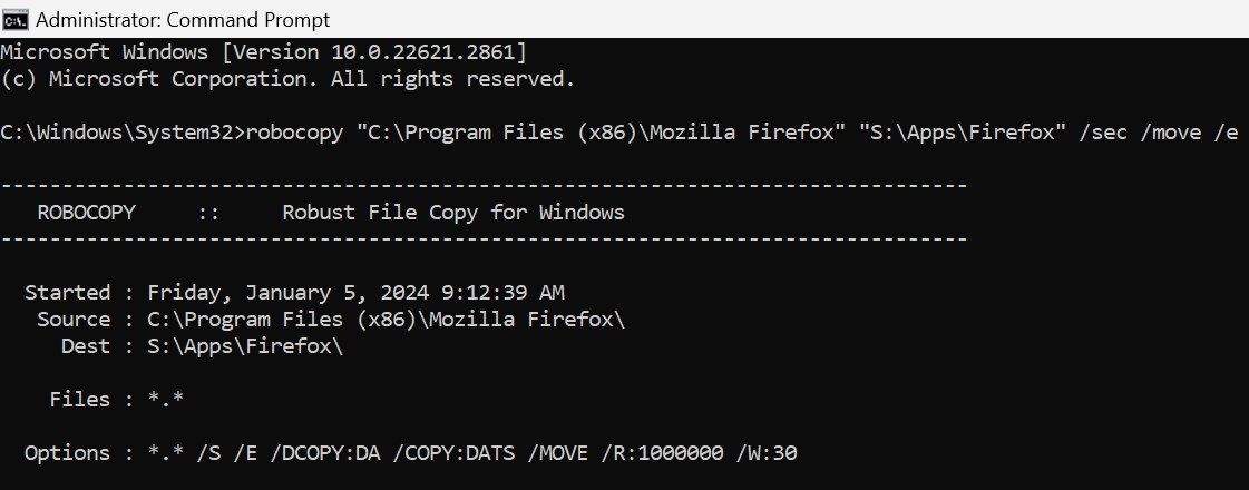 Running the Robocopy command in Windows Command Prompt to relocate Mozilla Firefox from one drive to another on Windows.