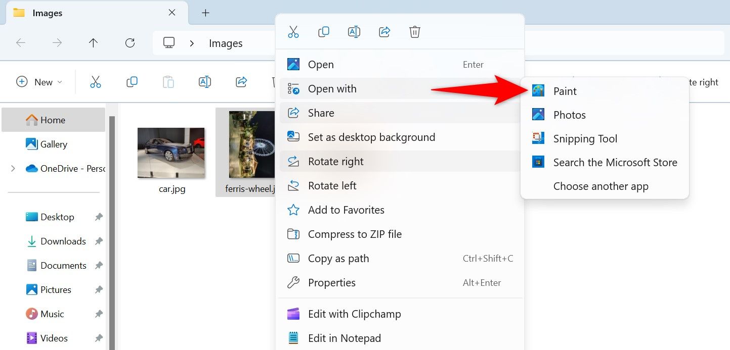 Open With > Paint highlighted in a picture's context menu.