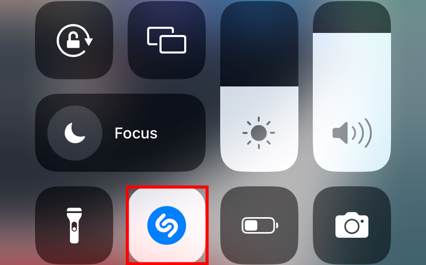 The Shazam icon turns blue when it is active. 
