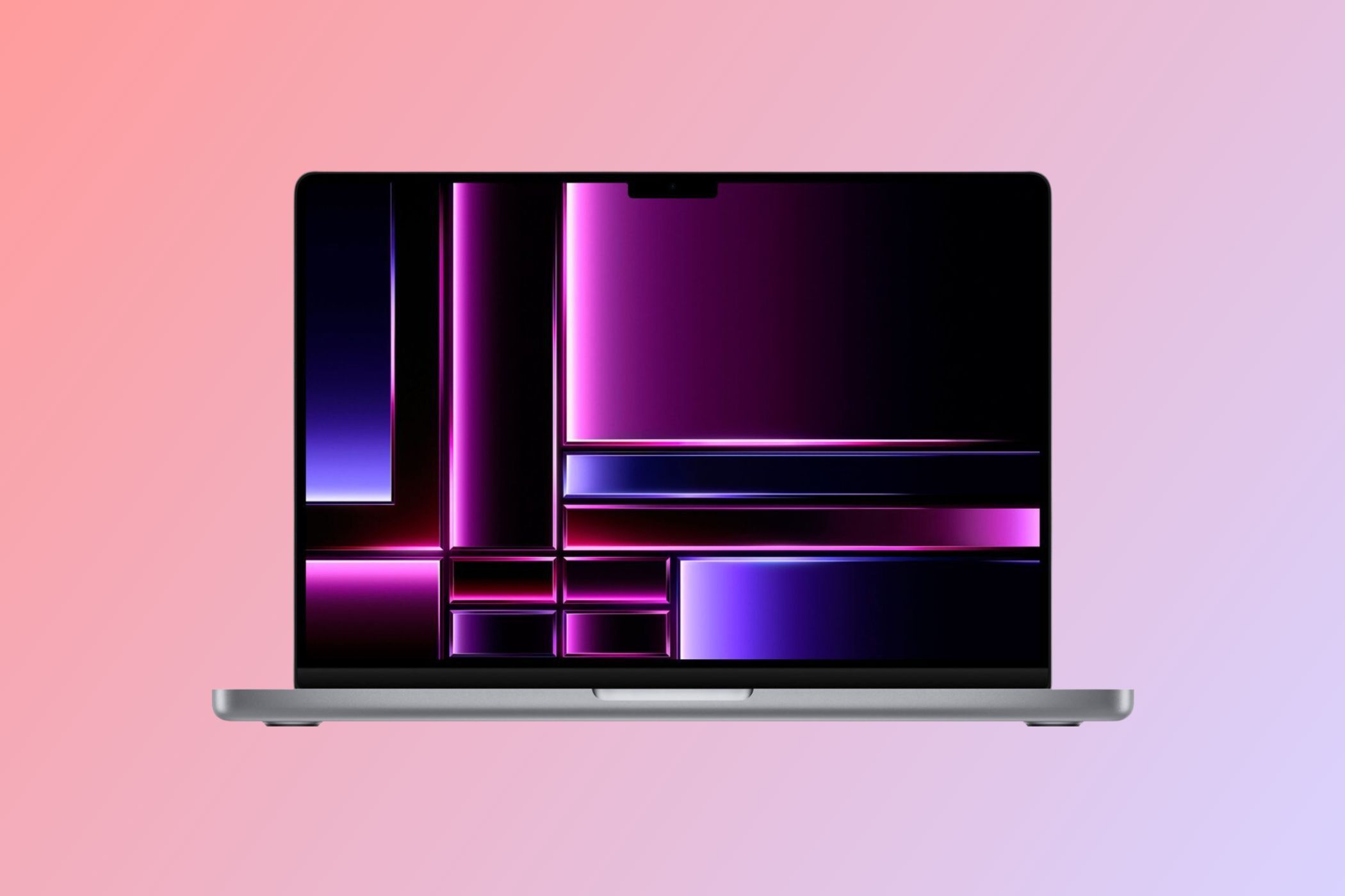 Apple MacBook Pro with M2 Pro chip on pink background