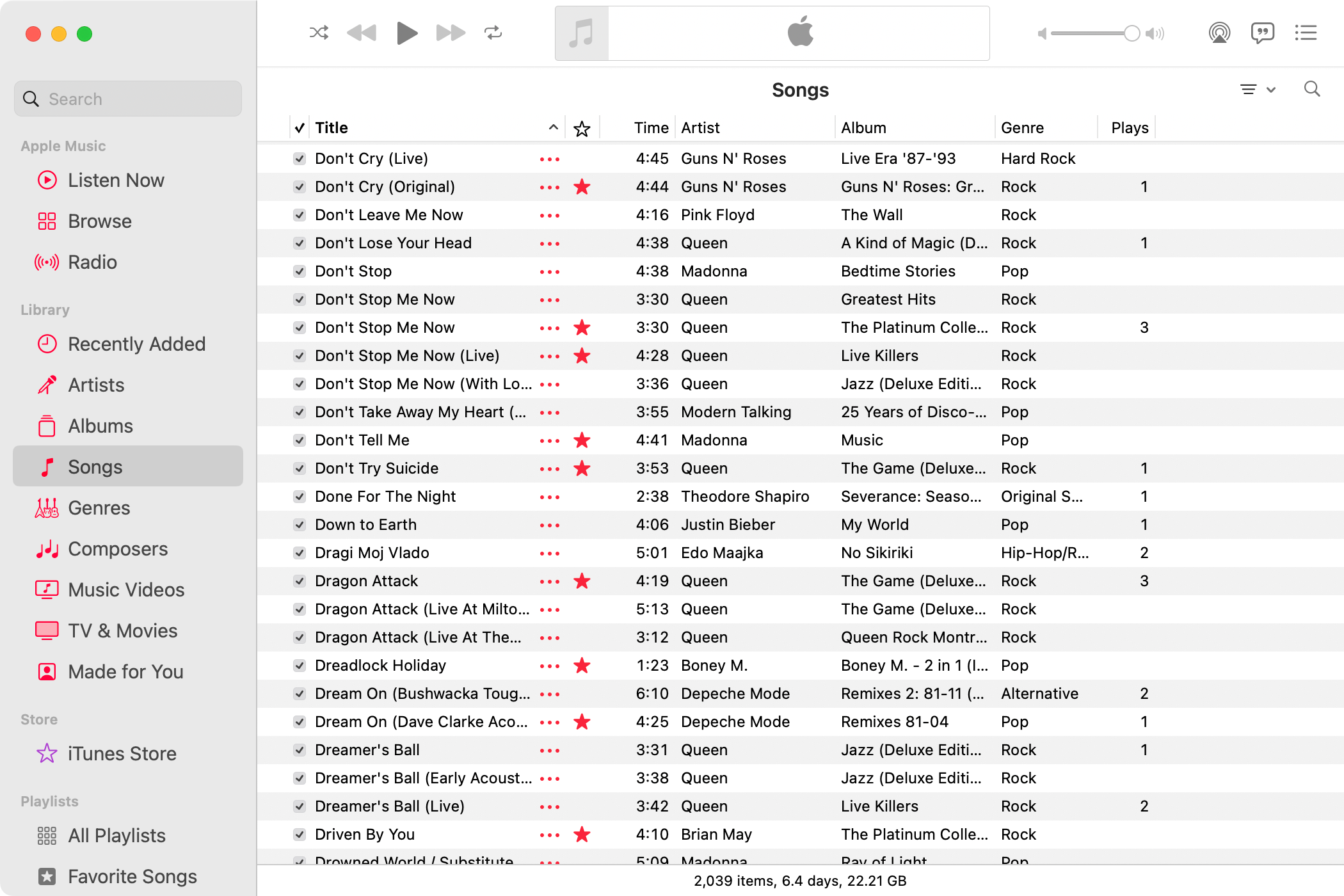 Music for Mac with Songs selected in the sidebar and tracks on the right, with some showing the favorites star icon.