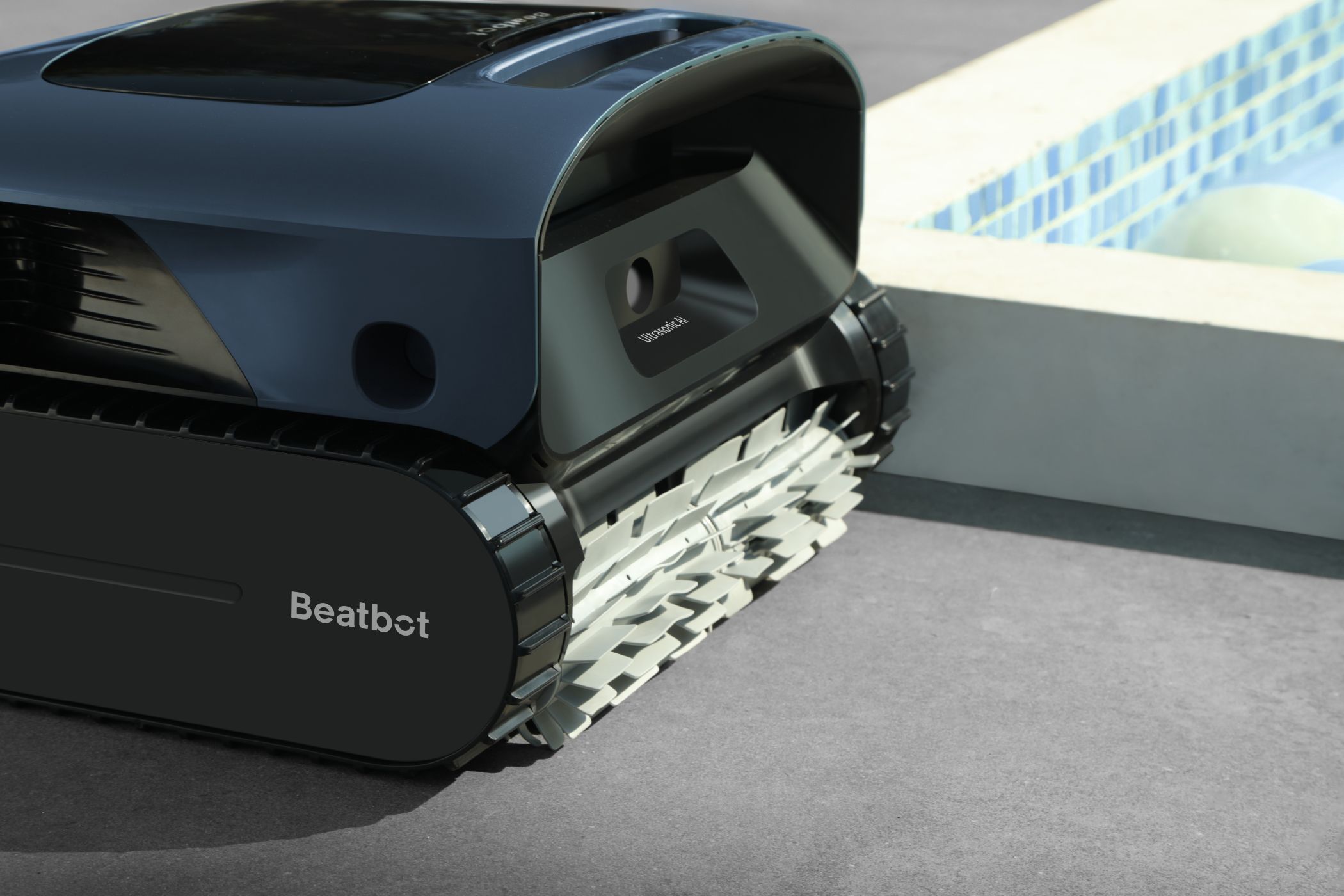 The Beatbot AquaSense Pro Next to a Pool