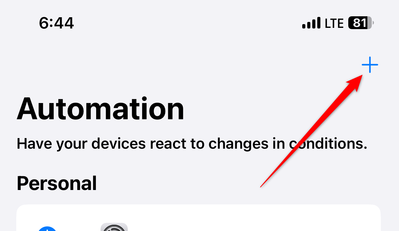 The 'plus' button for creating a new automation in the iPhone Shortcuts app.