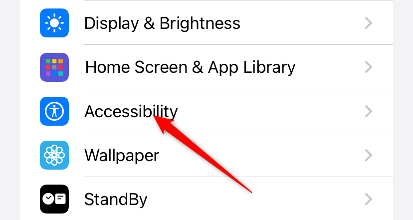 iPhone's Settings page with 'Accessibility' highlighted.
