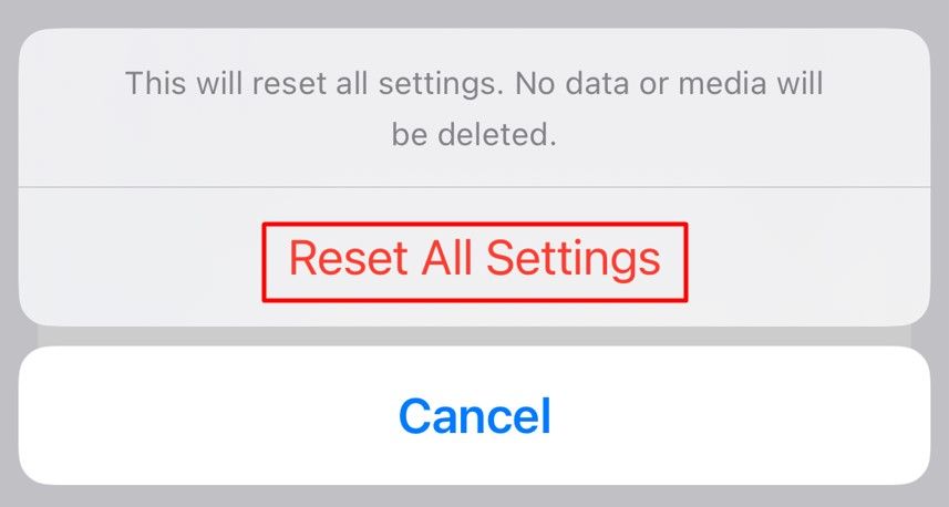 Reset All Settings confirmation in the iPhone Settings app.