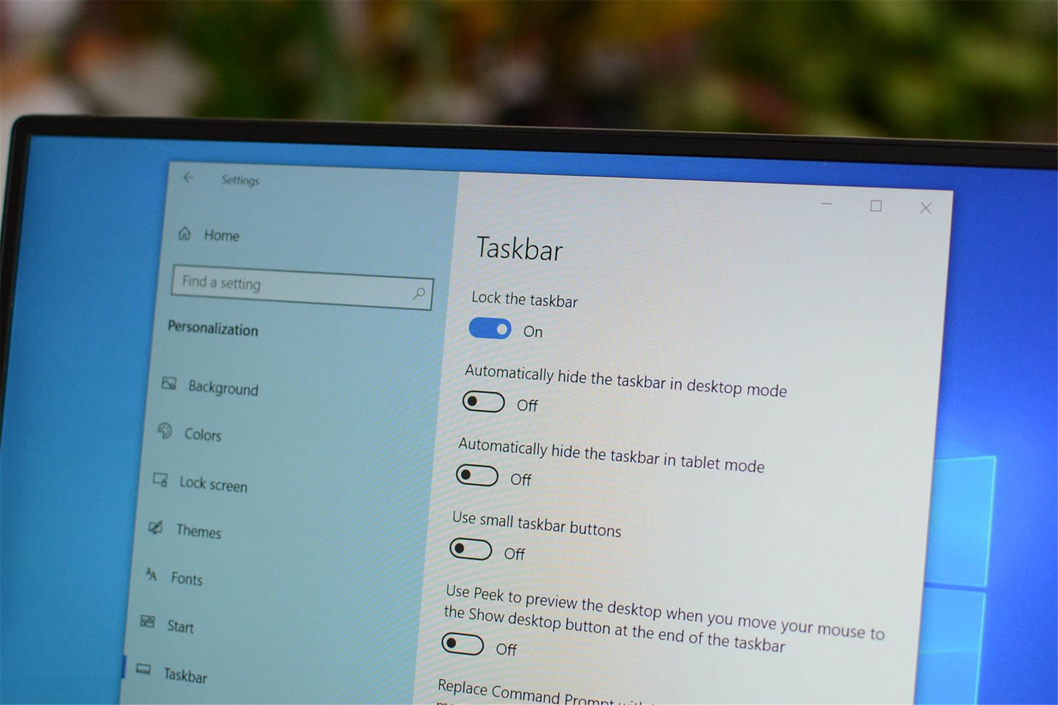 The Taskbar Settings page in the Settings app is used to adjust the size of taskbar icons. 