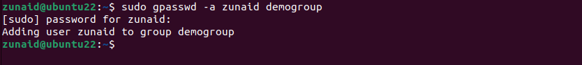The Linux terminal showing how to use the gpasswd command to add a member to a group